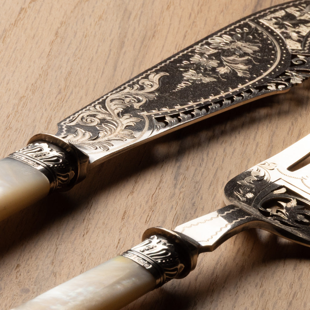 Silver and Pearl Handle Servers
