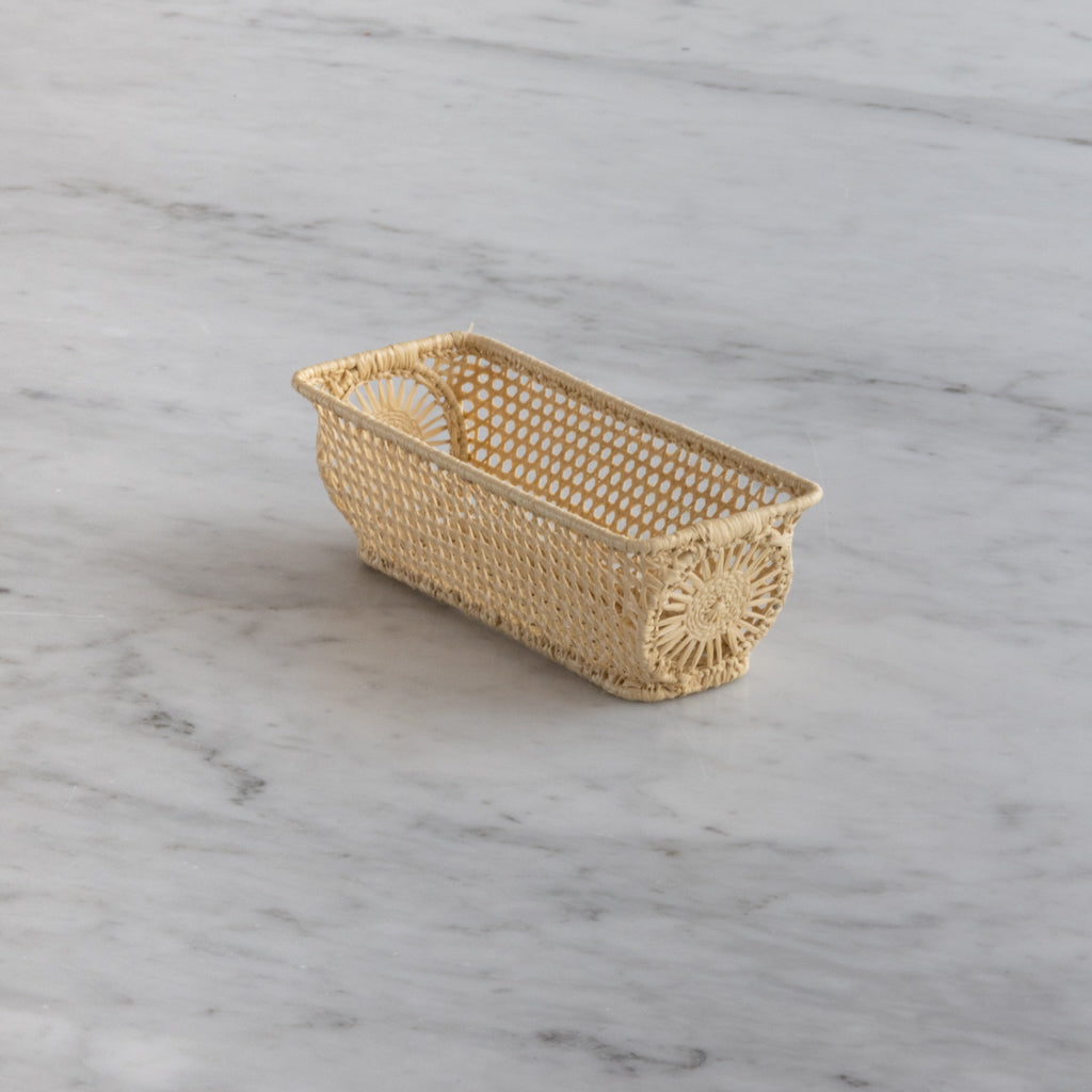 Small straw empty basket for small towels.