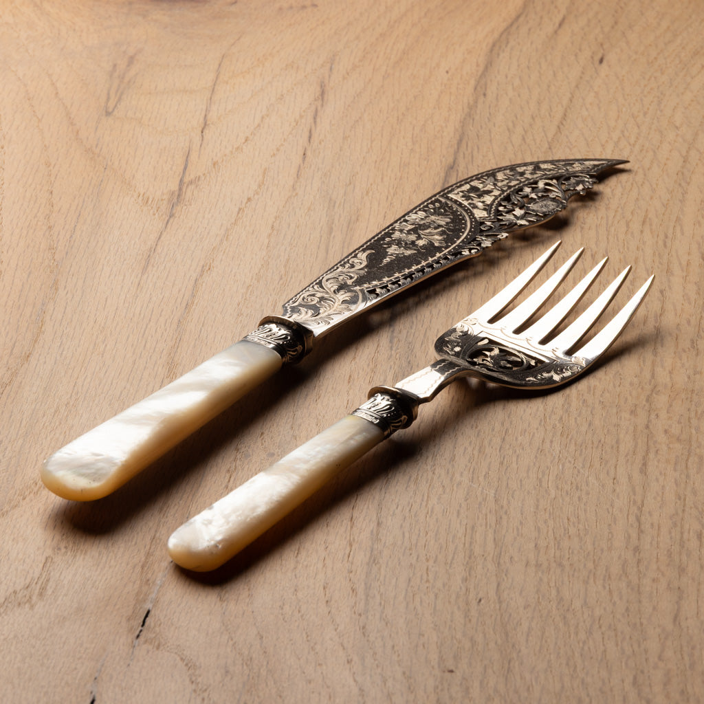 Silver and Pearl Handle Servers