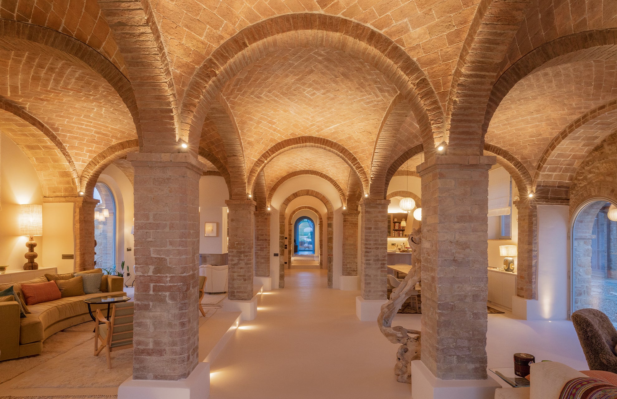 Luxurious interior living room with arched ceilings and stone columns